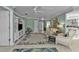 Spacious living room featuring neutral tile flooring, and an open layout at 3106 Heron Shores Dr, Venice, FL 34293