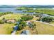 Stunning aerial view of the property, highlighting the expansive lot, pool, and surrounding waterways at 3123 David St, Punta Gorda, FL 33982