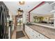 Functional kitchen with extended countertop, white cabinets and modern appliances at 3123 David St, Punta Gorda, FL 33982