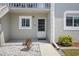 Inviting entrance with a well-lit walkway and fresh landscaping creating a welcoming first impression at 3310 Loveland Blvd # 1102, Punta Gorda, FL 33980