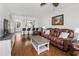Open concept living space with a view of the kitchen, creating a warm and inviting atmosphere at 3310 Loveland Blvd # 1102, Punta Gorda, FL 33980