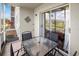 The screened patio offers outdoor dining space and views of surrounding landscape and neighborhood at 3310 Loveland Blvd # 1102, Punta Gorda, FL 33980