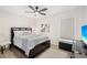 Bedroom featuring neutral walls, a ceiling fan, and a dark colored bed frame at 4146 Library St, Port Charlotte, FL 33948