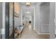 Inviting foyer with light gray walls, tile flooring, and stylish decor at 43839 Seedling Ter, Punta Gorda, FL 33982