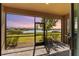 Screened-in lanai offering scenic views of a lake, perfect for relaxing and entertaining at 43839 Seedling Ter, Punta Gorda, FL 33982