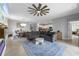 Expansive open-concept layout featuring a living area, dining space, and kitchen, ideal for Gathering gatherings at 43839 Seedling Ter, Punta Gorda, FL 33982