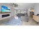Spacious open-concept living area with a living room, dining area, and kitchen, perfect for entertaining at 43839 Seedling Ter, Punta Gorda, FL 33982