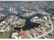 Stunning aerial view of homes surrounding a beautiful waterway, providing waterfront living at 612 Macedonia Dr, Punta Gorda, FL 33950