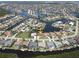 Expansive aerial shot showing beautiful waterfront community with stunning water access and boat docks at 612 Macedonia Dr, Punta Gorda, FL 33950