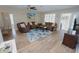 Comfortable living room with hardwood floors, cozy furniture, and ample natural light at 612 Macedonia Dr, Punta Gorda, FL 33950