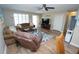 Inviting living room with hardwood floors, comfortable seating, and a view of the entryway at 612 Macedonia Dr, Punta Gorda, FL 33950