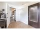 Mud room with tile floors, access to the kitchen and an exit door at 661 Athos Ter, Port Charlotte, FL 33952