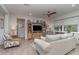 Comfortable living room featuring neutral tones, stylish furniture, and ample natural light at 8117 Thruso Rd, Port Charlotte, FL 33981