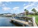 Waterfront home featuring a private dock offering boating and water activities at 814 Via Tripoli, Punta Gorda, FL 33950