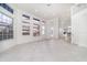 Spacious living room with tile floors, soaring ceilings, and large windows for lots of natural light at 814 Via Tripoli, Punta Gorda, FL 33950