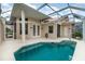 Inviting screened-in pool area with ample patio space for entertaining at 814 Via Tripoli, Punta Gorda, FL 33950