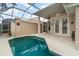 Screened in private pool with tranquil outdoor space and plenty of seating at 814 Via Tripoli, Punta Gorda, FL 33950