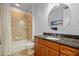 The bathroom offers a shower/tub combination, and a vanity with a granite countertop at 95 N Marion Ct # 126, Punta Gorda, FL 33950