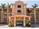 The building's entrance features lovely landscaping, a red tile roof and an upscale exterior at 95 N Marion Ct # 126, Punta Gorda, FL 33950