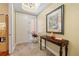 Foyer features tile floors, artwork, and neutral color palette at 95 N Marion Ct # 126, Punta Gorda, FL 33950