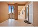 Hallway with covered balcony features tiled floors and a neutral color palette at 95 N Marion Ct # 126, Punta Gorda, FL 33950