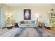 Bright living room with elegant seating, a decorative rug, and serene natural light at 95 N Marion Ct # 126, Punta Gorda, FL 33950