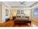 Serene main bedroom with tray ceiling and hardwood floors at 95 N Marion Ct # 126, Punta Gorda, FL 33950