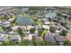 Aerial view of a beautiful home in a serene lakeside community at 2836 Suncoast Lakes Blvd, Punta Gorda, FL 33980