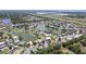 Stunning aerial view of the community with beautiful lakes and lush landscaping at 2836 Suncoast Lakes Blvd, Punta Gorda, FL 33980
