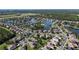 Breathtaking aerial view of a well-planned community with winding roads and scenic lakes at 2836 Suncoast Lakes Blvd, Punta Gorda, FL 33980