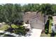 Stunning single Gathering home with a well-manicured lawn, tile roof, and attached two car garage at 2836 Suncoast Lakes Blvd, Punta Gorda, FL 33980