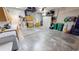 Spacious garage featuring storage cabinets, utility sink, and plenty of open space at 2836 Suncoast Lakes Blvd, Punta Gorda, FL 33980