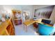Spacious office with desk, bookshelf, and view to other rooms of the house at 2836 Suncoast Lakes Blvd, Punta Gorda, FL 33980