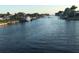 Beautiful wide canal with calm waters, private docks, and lush greenery at 123 Poinsettia Ne Cir, Port Charlotte, FL 33952
