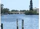Picturesque water view from the dock with a bridge in the background at 123 Poinsettia Ne Cir, Port Charlotte, FL 33952