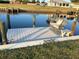 Waterfront home with a private dock for relaxing and enjoying the peaceful canal views at 123 Poinsettia Ne Cir, Port Charlotte, FL 33952