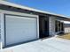 A charming single story home with a well-maintained front yard and a one car garage at 123 Poinsettia Ne Cir, Port Charlotte, FL 33952