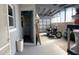 Garage with motorcycle offers ample space for storage and hobbies at 123 Poinsettia Ne Cir, Port Charlotte, FL 33952