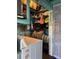 Storage closet with water heater and washing machine at 123 Poinsettia Ne Cir, Port Charlotte, FL 33952