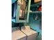 Practical laundry area equipped with a washer, dryer, and water heater for convenient home maintenance at 123 Poinsettia Ne Cir, Port Charlotte, FL 33952