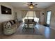 Cozy living room with tile flooring and a comfortable seating area, creating a welcoming atmosphere at 123 Poinsettia Ne Cir, Port Charlotte, FL 33952