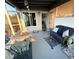 Comfortable screened porch with outdoor seating, creating a relaxed space with sunset views at 123 Poinsettia Ne Cir, Port Charlotte, FL 33952