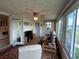 Bright sunroom with great outdoor views and comfortable furniture at 123 Poinsettia Ne Cir, Port Charlotte, FL 33952