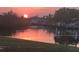 Breathtaking view of waterfront property at sunset at 123 Poinsettia Ne Cir, Port Charlotte, FL 33952