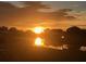 Golden sunset view over the water, creating a serene and picturesque scene at 123 Poinsettia Ne Cir, Port Charlotte, FL 33952