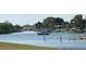 Scenic view of the serene canal perfect for boating or waterside relaxation at 123 Poinsettia Ne Cir, Port Charlotte, FL 33952