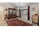 Formal dining room with elegant furnishings, lighting and traditional accents at 1240 Alpinia Rd, North Port, FL 34288
