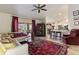Inviting living area with sliding glass doors to the lanai and a view of the adjacent kitchen at 1240 Alpinia Rd, North Port, FL 34288