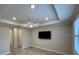 Spacious bedroom with recessed lighting and a flat screen TV installed at 1263 Cicely Ct, North Port, FL 34289
