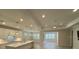 Spacious living room and kitchen with open floor plan and modern finishes at 1263 Cicely Ct, North Port, FL 34289